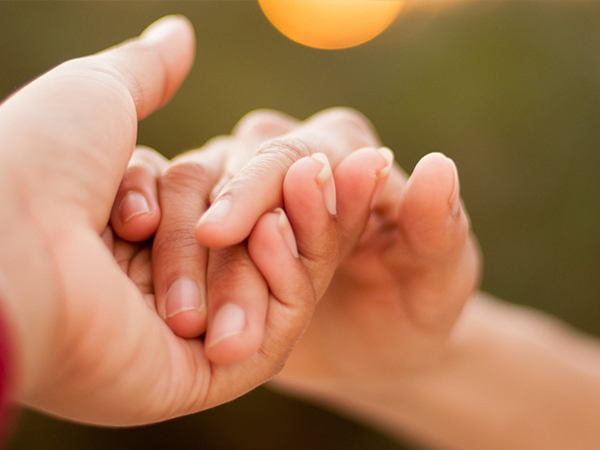 Helping hand handshake